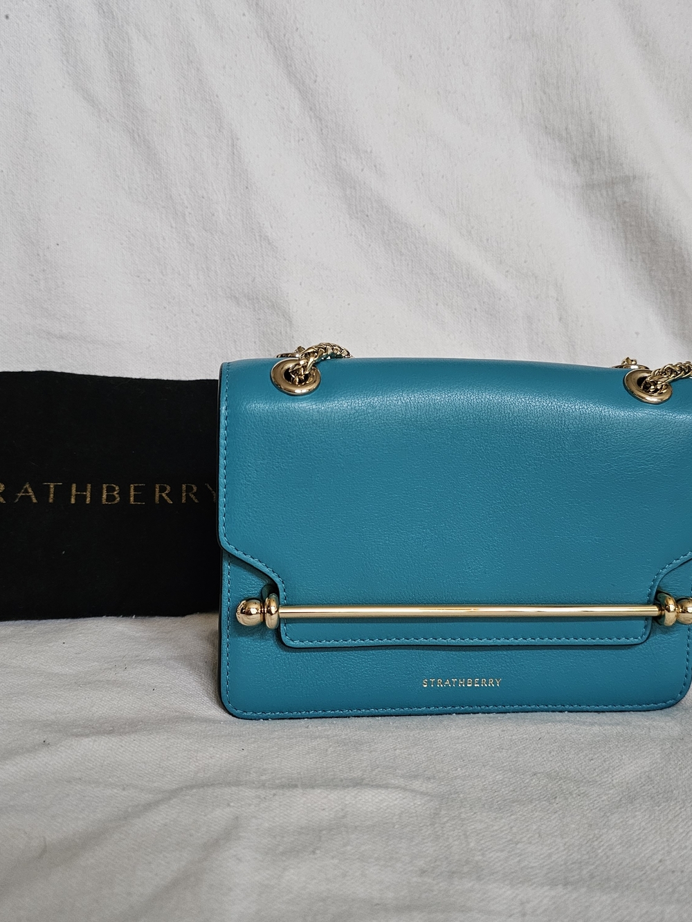 Strathberry Turquoise Leather East/West Crossbody with Gold Bar